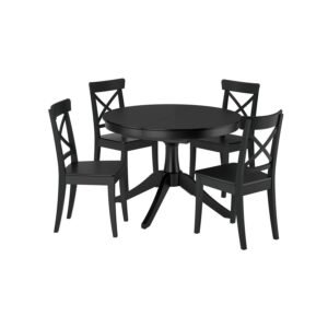 Black wooden round extendable used dining table set with 4 cross back chairs in Abu Dhabi