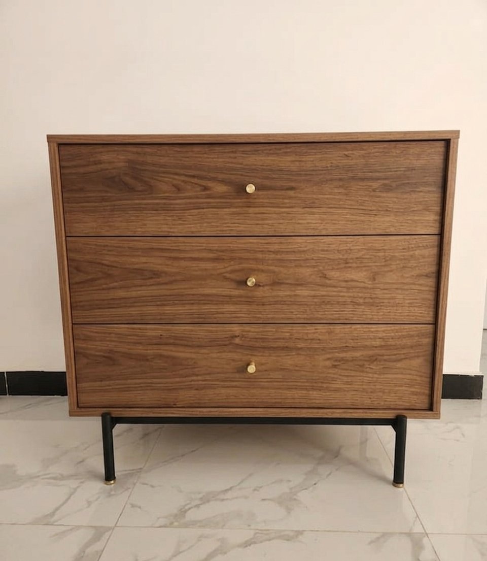Modern walnut wooden 3 drawer chest of drawers with gold cylinder handles and black metal legs
