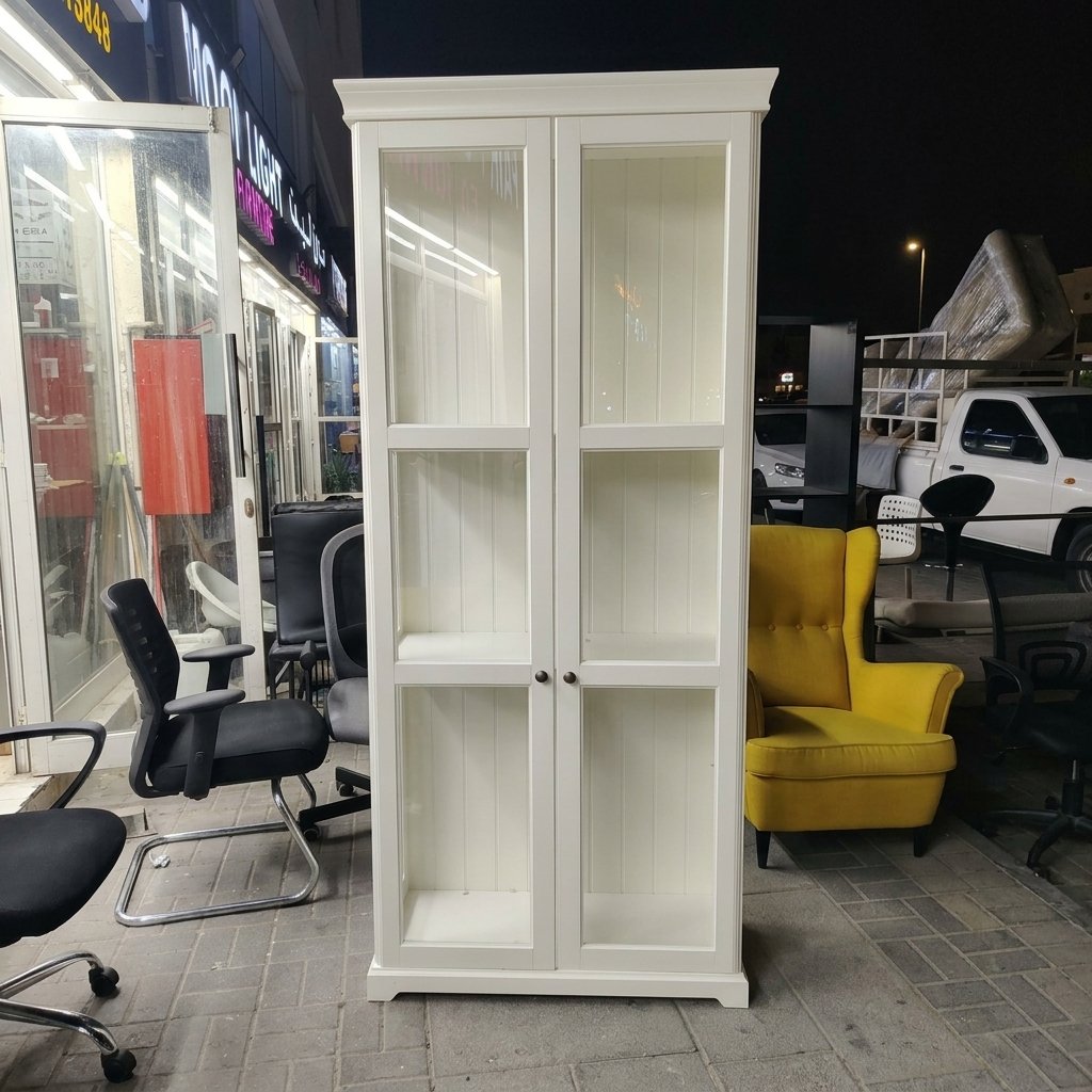 Modern white 2-door glass display cabinet with adjustable shelves at Fairy of Fortune Used