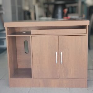 Compact brown wood-grain office sideboard and computer workstation storage cabinet with open shelf and cabinet door at Fairy of Fortune Used Furniture Abu Dhabi