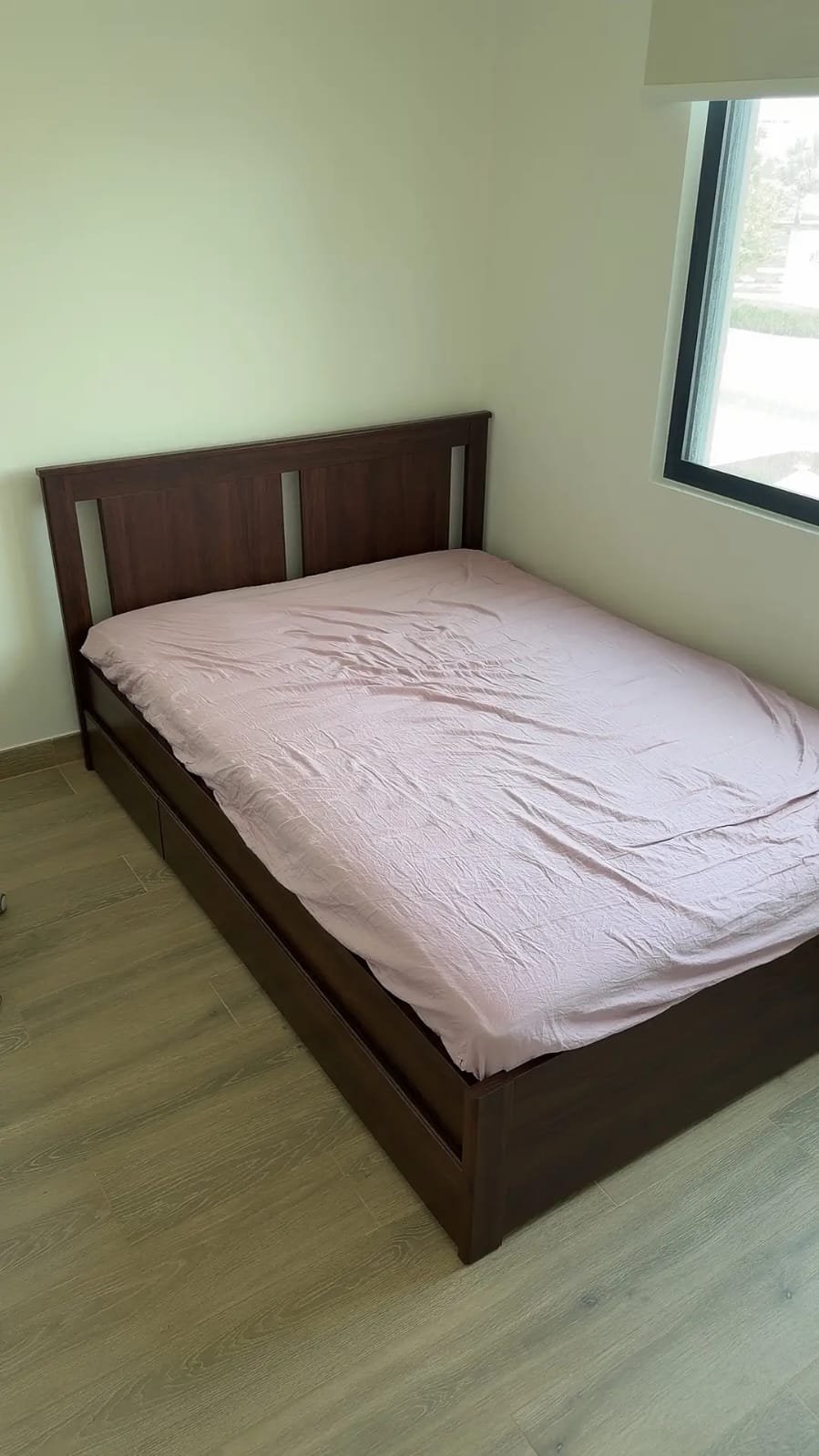 Dark walnut queen wooden storage bed frame 160x200 cm with under-bed storage drawers, slatted mattress base, mattress, and matching bedside nightstands at Fairy of Fortune Used Furniture Abu Dhabi